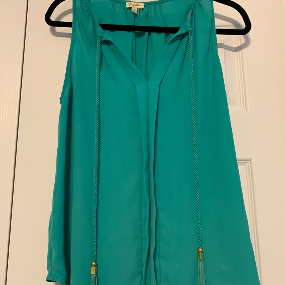 Aqua flowy tank with tassle accent